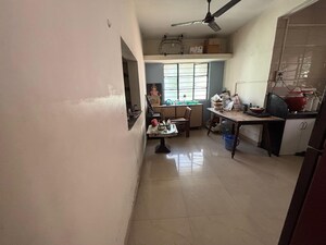 Kitchen in 2 BHK Apartment at Chintamani Residency Bhusari, Bhusari Colony – for Rent
