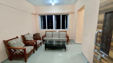 Living Room in 1 BHK Apartment at Royal Palms, Goregaon East – for Rent