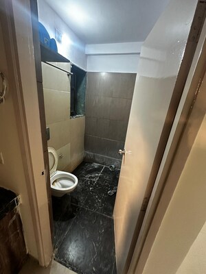 Bathroom in 2 BHK Apartment at Near Vaishno Devi Circle On Sg Highway – for Sale