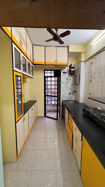 Kitchen in 1 BHK Apartment at Kshitij CHS, Goregaon East – for Rent