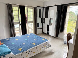 Bedroom in 3 BHK Apartment at Kapil Malhar Apartment, Baner – for Rent
