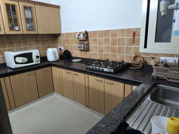 Kitchen in 1 BHK Apartment at Signature The Millennia 3, Sector 37d – for Rent