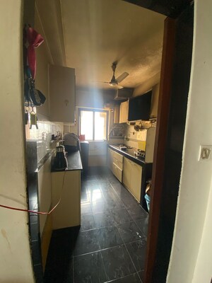 Kitchen in 3 BHK Apartment at Hiranandani Garden Brentwood, Powai – for Rent