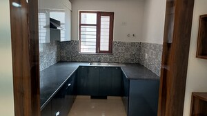 Kitchen in 2 BHK Builder Floor at RPS Palm Drive, Sector 88 – for Rent