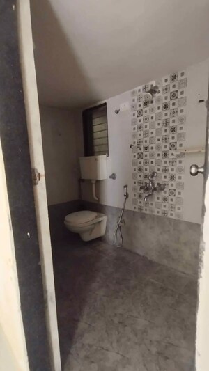 Bathroom in 2 BHK Apartment at Vini Heights, Nalasopara West – for Rent