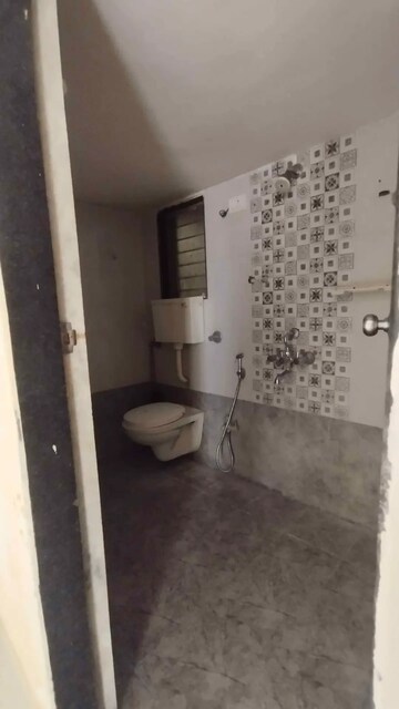 Bathroom in 2 BHK Apartment at Vini Heights, Nalasopara West – for Rent