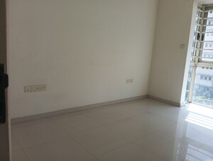 Room in 2 BHK Apartment at Sheth Vasant Lawns, Laxmi Nagar – for Sale