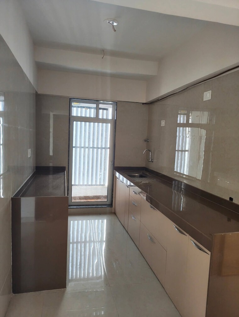 Kitchen, je-and-vee-om-trimurti 1 Bedroom 645 Sq.Ft. Apartment In Malad East Mumbai 9482604