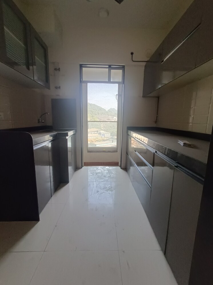 Kitchen, jp-north-euphoria 3 Bedroom 915 Sq.Ft. Apartment In Mira Road Thane 9482653