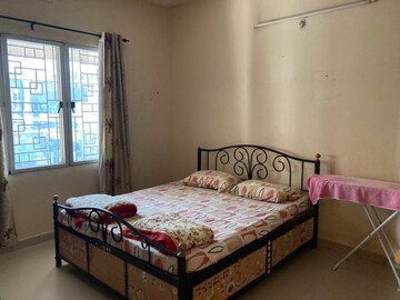 Bedroom in 2 BHK Apartment at Naiknavare Mystique Mood, Viman Nagar – for Rent