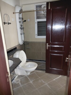 Bathroom in 2 BHK Apartment at Aditya Mega City, Vaibhav Khand – for Sale