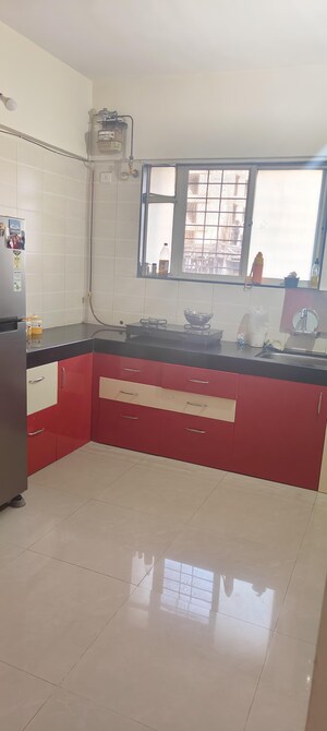 Kitchen in 2 BHK Apartment at Siddhi Nisarg, Wakad – for Rent