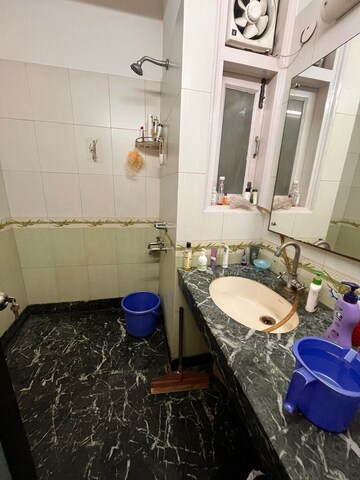 Bathroom in 2 BHK Apartment at Ganga Apartments Burari, Burari – for Sale