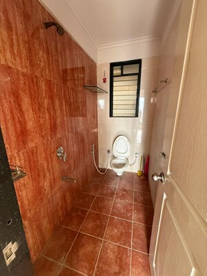 Bathroom in 2 BHK Apartment at Arihant Aarohi, Padle – for Rent