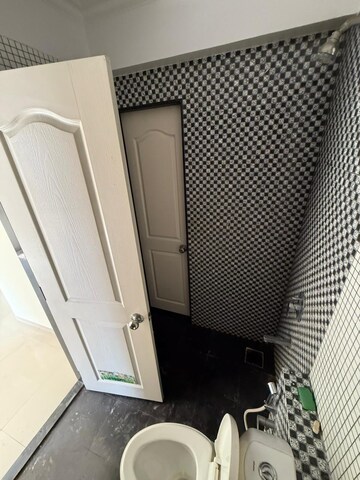 Bathroom in 2 BHK Apartment at Arihant Aarohi, Padle – for Rent