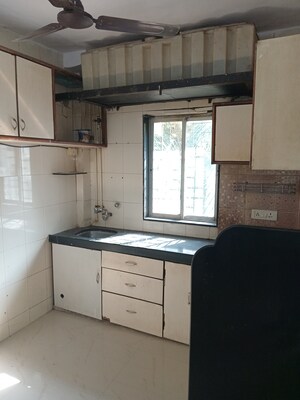 Kitchen in 1 BHK Apartment at Rameshwar Darshan CHS, Andheri West – for Sale