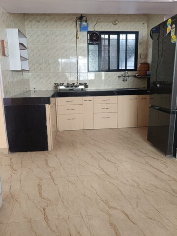 Kitchen in 2 BHK Apartment at Sun City, Sinhagad Road – for Rent