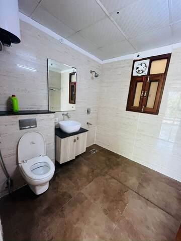 Bathroom in 3 BHK Builder Floor at Hong Kong Bazaar, Sector 57 – for Rent