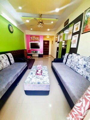 Living Room in 2 BHK Apartment at Shri Vardhaman Vatika, Thergaon – for Sale