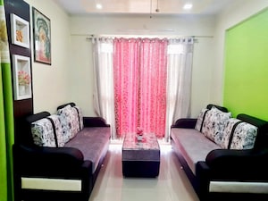 Living Room in 2 BHK Apartment at Shri Vardhaman Vatika, Thergaon – for Sale