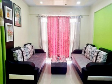 Living Room in 2 BHK Apartment at Shri Vardhaman Vatika, Thergaon – for Sale