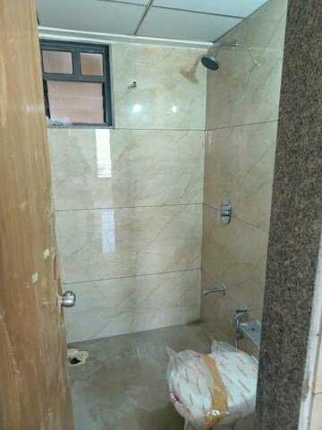 Bathroom in 3 BHK Apartment at Chandkheda – for Rent