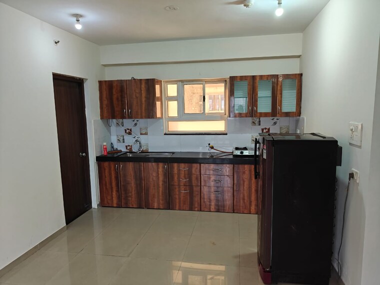 Kitchen, the-chatterjee-the-crown-greens 2 Bedroom 857 Sq.Ft. Apartment In Hinjewadi Pune 9484552
