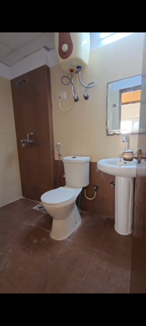 Bathroom in 3 BHK Apartment at Mahagun Moderne, Sector 78 – for Sale