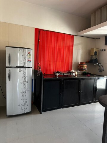 Kitchen in 2 BHK Apartment at Swarna Apartments, Mira Road – for Sale