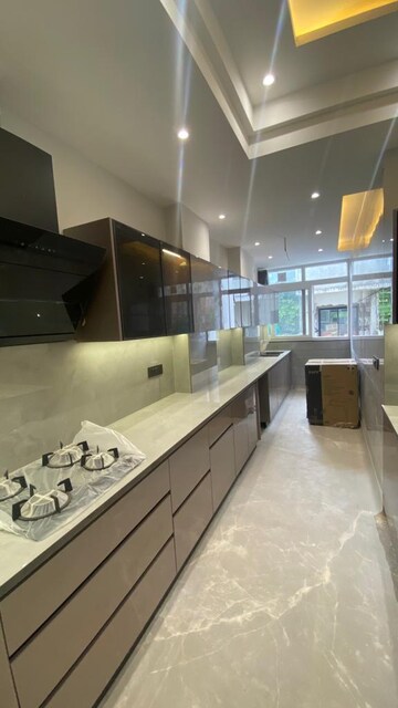 Kitchen in 4 BHK Builder Floor at Sarvodaya Enclave – for Sale