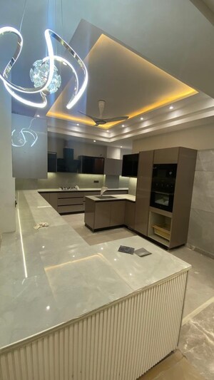 Kitchen in 4 BHK Builder Floor at Sarvodaya Enclave – for Sale