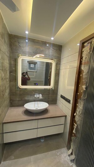Bathroom in 4 BHK Builder Floor at Sarvodaya Enclave – for Sale