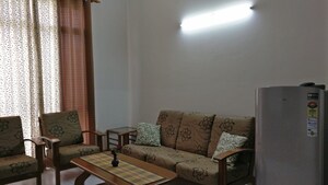 Living Room in 1 BHK Apartment at Jaypee Greens Star Court, Jaypee Greens – for Rent