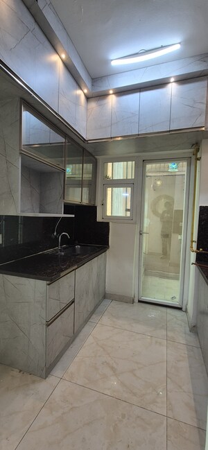 Kitchen in 2 BHK Apartment at Gaurs Siddhartham, Siddharth Vihar – for Rent