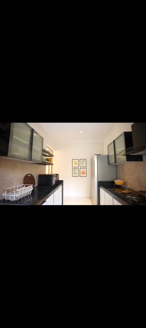 Kitchen in 2 BHK Apartment at Godrej Exquisite, Ghodbunder Road – for Sale