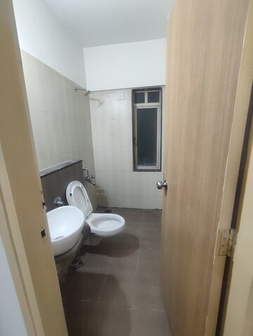 Bathroom in 2 BHK Apartment at Ashish Parkwoods, Ghodbunder Road – for Rent