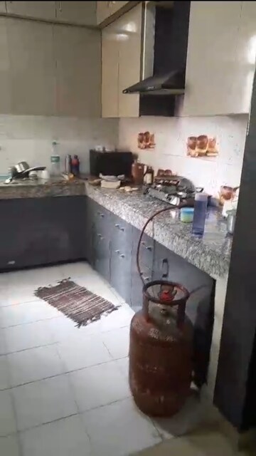 Kitchen in 2 BHK Apartment at Proview Officer City, Raj Nagar Extension – for Sale