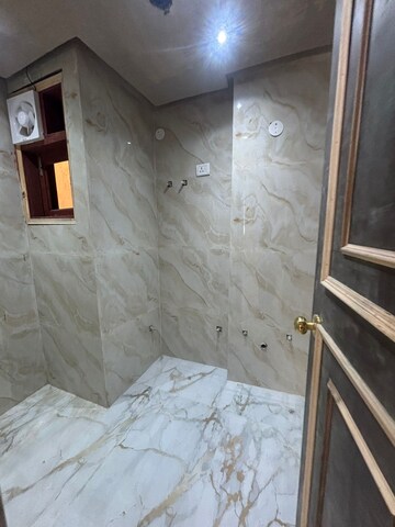 Bathroom in 1.5 BHK Apartment at Palm Residency Chhatarpur, Chattarpur – for Rent
