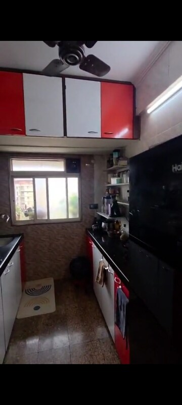 Kitchen in 2 BHK Apartment at Prem Karan Complex, Mira Road – for Sale