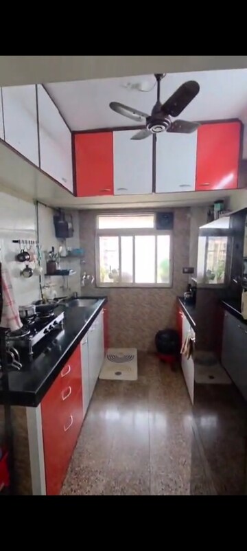 Kitchen in 2 BHK Apartment at Prem Karan Complex, Mira Road – for Sale