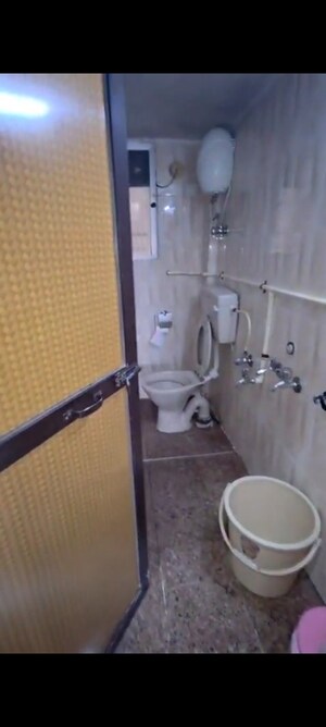 Bathroom in 2 BHK Apartment at Prem Karan Complex, Mira Road – for Sale