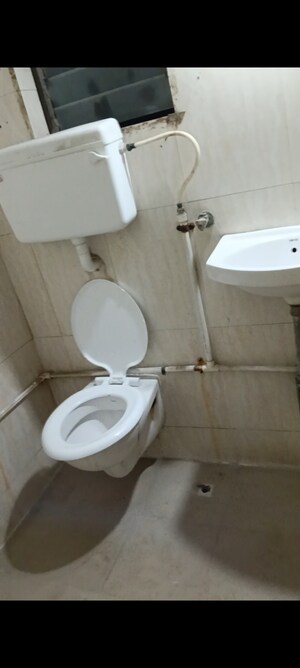 Bathroom in 2 BHK Apartment at Gaurav Woods, Mira Road – for Rent