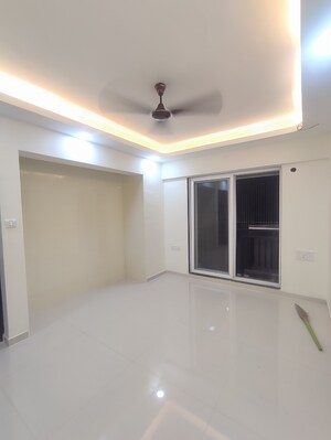 Living Room in 1 BHK Apartment at Raunak Bliss B1, Ghodbunder Road – for Rent