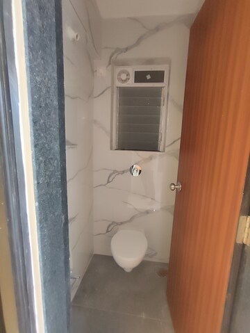 Bathroom in 1 BHK Apartment at Raunak Bliss B1, Ghodbunder Road – for Rent