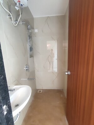 Bathroom in 1 BHK Apartment at Raunak Bliss B1, Ghodbunder Road – for Rent