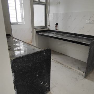 Kitchen in 2 BHK Apartment at Ganga Legend, Sidhart Nagar – for Sale