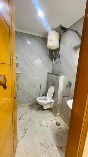 Bathroom in 1 BHK Apartment at Palm Residency Chhatarpur, Chattarpur – for Rent