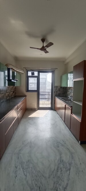 Kitchen in 3.5 BHK Builder Floor at Paarth Apartments, Sector 55 – for Rent