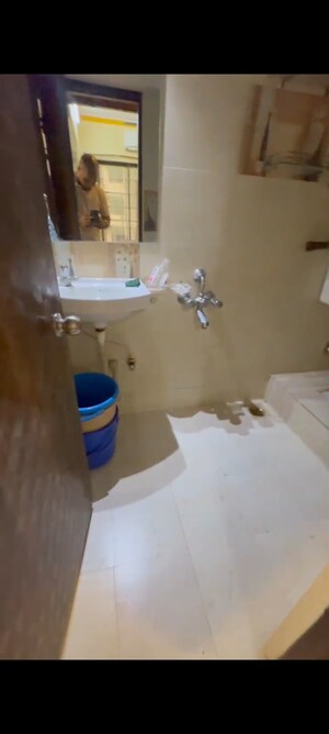 Bathroom in 2 BHK Apartment at RR Hill Galaxy, Mira Road – for Sale