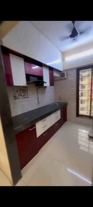 Kitchen in 2 BHK Apartment at RR Hill Galaxy, Mira Road – for Sale